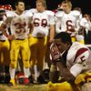 Del Sol running back Earnest Hall crouches down in sorrow after a 35-28 loss against Las Vegas High 