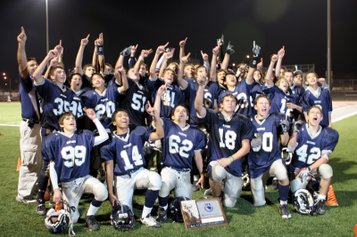 The Meadows football team celebrates its 2A state title with a 46-30 win against Pershing County at Arbor View High School on Saturday.
