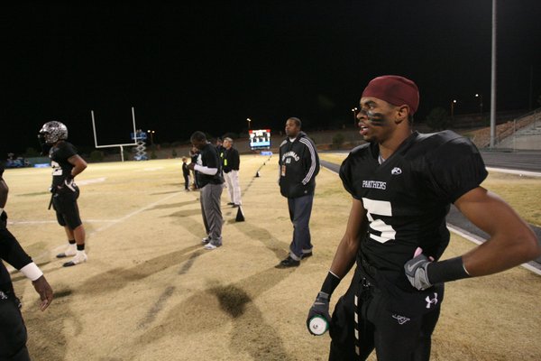 Palo Verde's Torin Harris (5) looks on from the sidelines ...