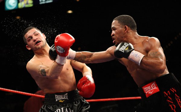 James Kirkland (right) connects on Brian Vera during their middleweight ...