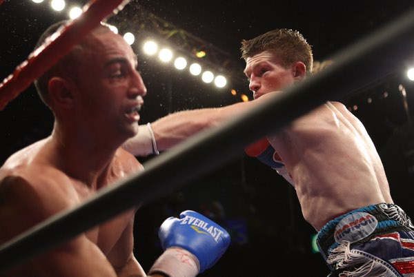 Ricky Hatton connects with Paulie Malignaggi during the pair's junior ...