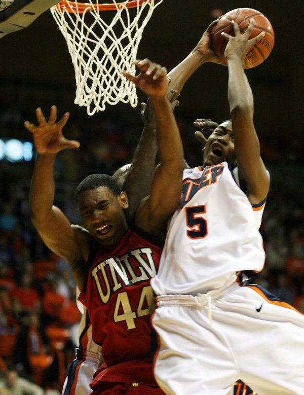 UTEP's Julyan Stone, right, grabs a rebound from UNLV's Darris ...
