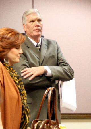 District Judge Donald Mosley and Terri Mosley stand while waiting for their son's court hearing to begin on Monday. Michael Mosley, 16, had been held in the Clark County Juvenile Detention Center for a week after being arrested on charges of driving under the influence of alcohol following the crash Nov. 14 that killed 15-year-old Olivia Brandise Hyten, a Coronado High School sophomore.