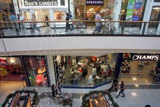 Trying to beat the after-Thanksgiving rush, shoppers hunt for gifts at the Galleria Mall on Monday.