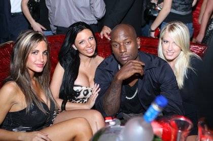Actor/singer Tyrese poses for a photo with friends at Tryst nightclub inside Wynn Las Vegas.