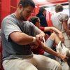 Las Vegas High School senior offensive lineman Madison Hales suits up for practice Wednesday in prep