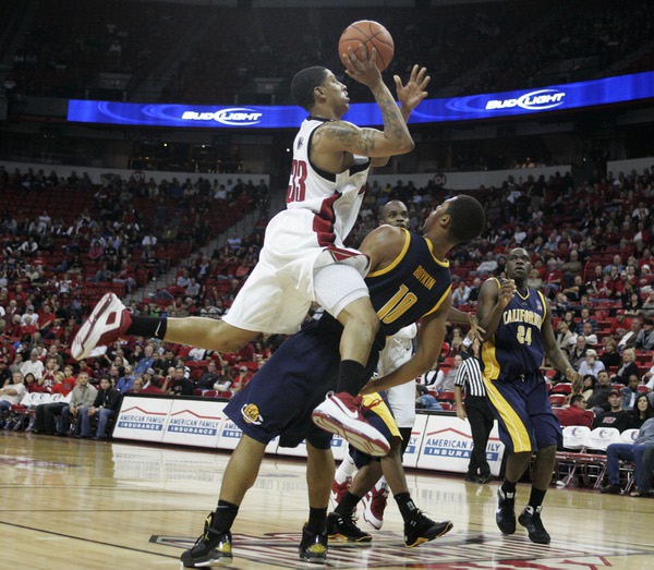 UNLV guard Tre'Von Willis fouls Cal forward Jamal Boykin during ...