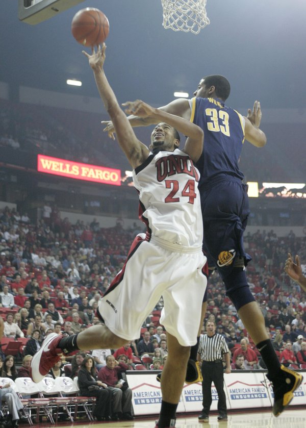 UNLV guard Renee Rougeau tries to get a shot past ...