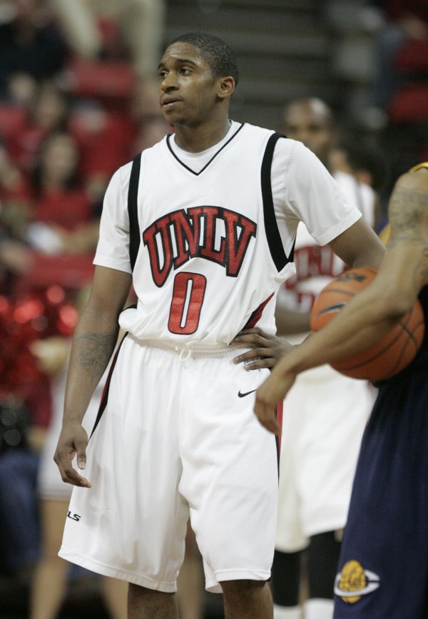 UNLV guard Oscar Bellfield waits as the final seconds tick ...