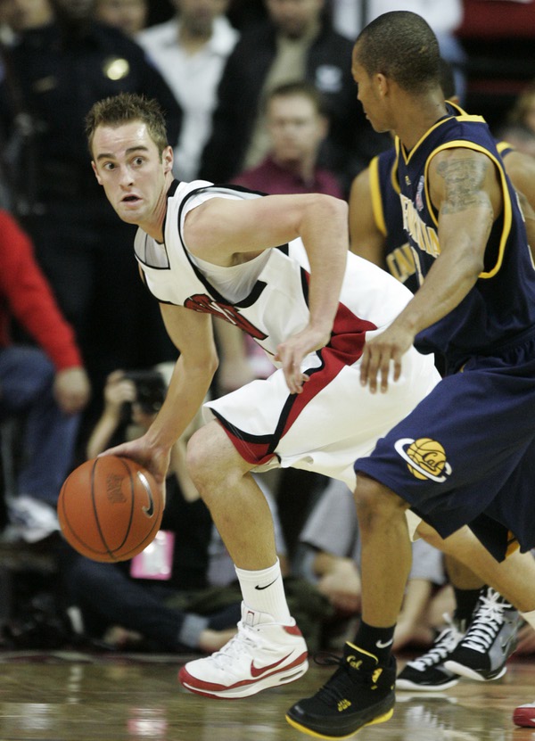 UNLV guard Kendall Wallace pushes upcourt after grabbing a rebound ...