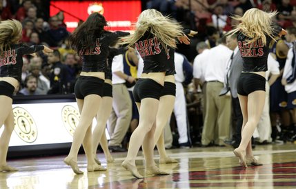 The Rebel girls perform during a timeout at the UNLV-California game Friday at the Thomas & Mack Center.