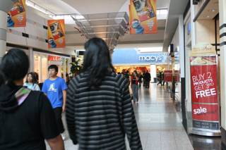 Shoppers at Boulevard mall take in the deals.