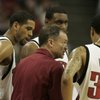 UNLV coach Lon Kruger talks with, from left, Rene Rougeau, Darris Santee and Tre'Von Willis during a break in the first half of their game against Cincinnati Saturday at the Thomas & Mack Center.