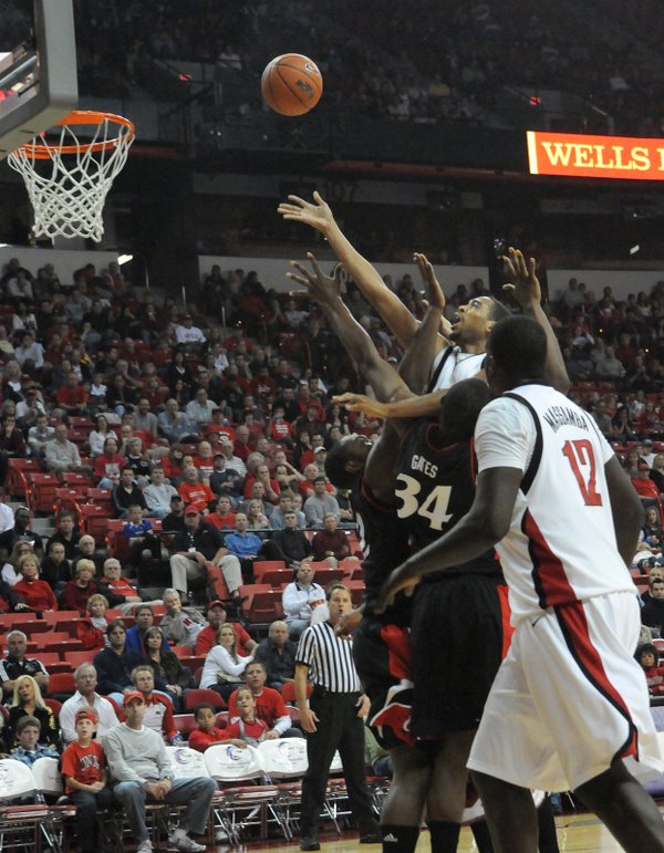 Rene Rougeau of UNLV looks for the ball over the ...
