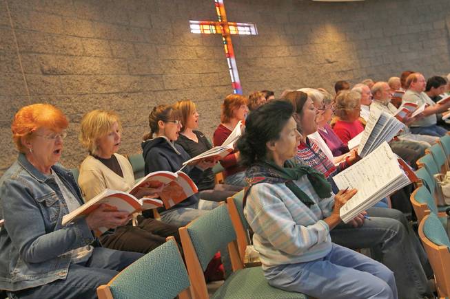 Members of the Peoples Valley Chorus sing "Glory to God" during rehearsal for the third annual "Do-It-Yourself Handel's Messiah" at Green Valley Presbyterian Church.
