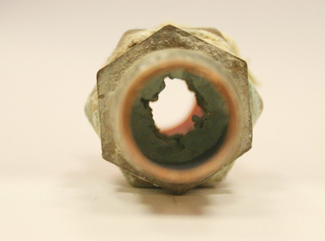 This IPEX water pipe fitting was taken from a Pulte home in Anthem. The corroded fittings can cause declining water pressure and leaks.