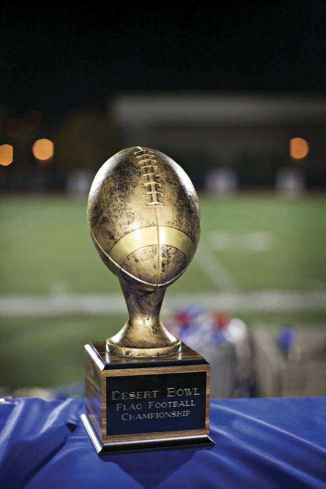 The Desert Bowl's faux-metal trophy -- as well as T-shirts and player medals -- was paid for by sponsor efollett, a college bookstore company.