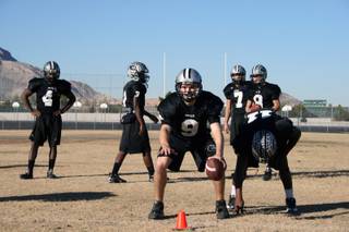 Palo Verde quarterback Kelly Zurowski (9) practices his cadences and hand-offs during practice Monday.
