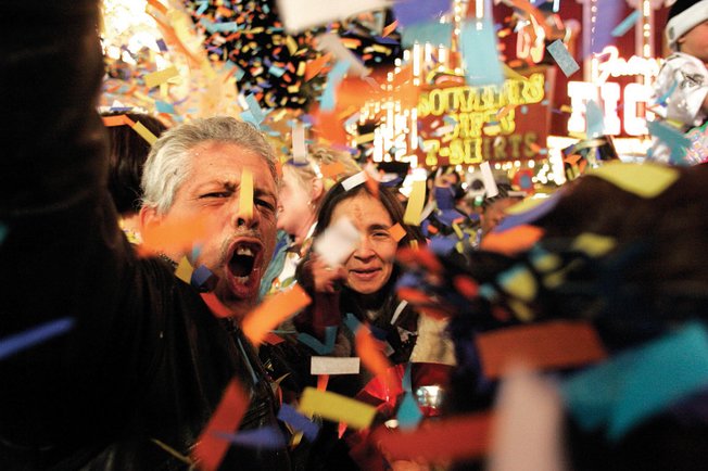 People watch the fireworks over the Plaza Hotel on Jan. 1, 2008 in downtown Las Vegas. 