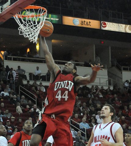 Darris Santee of UNLV goes up for the dunk Wednesday night as the Rebels take on the Fresno State Bulldogs at the Save Mart Center in Fresno, Calif.