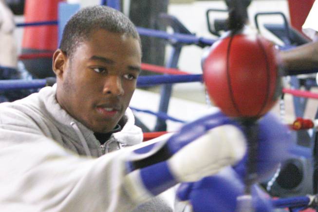 DeHaven Alexander Jr. warms up during practice at the Gil Martinez Boxing Gym.