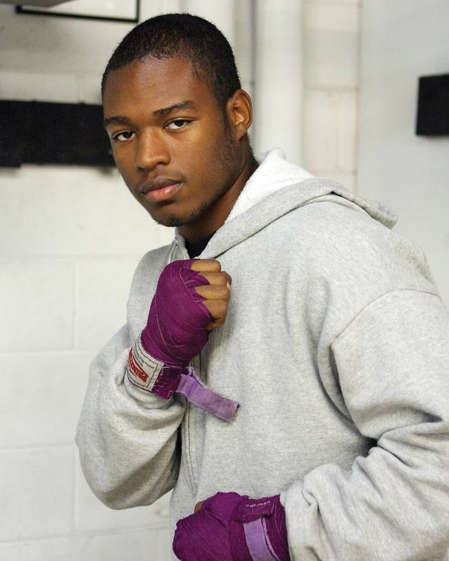 DeHaven Alexander Jr., a junior at Del Sol, poses before a boxing practice session.