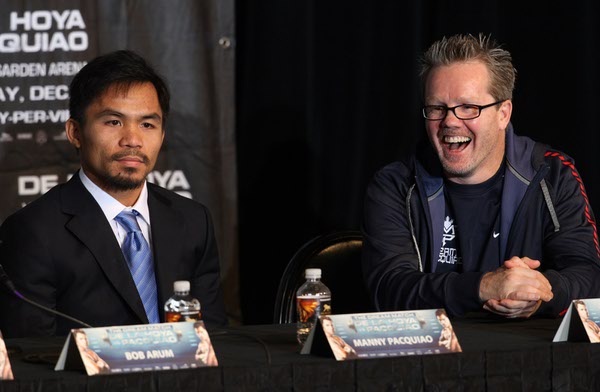 Boxer Manny Pacquiao, left, of Philippines and his trainer Freddie ...
