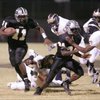 Palo Verde quarterback Jarrell Harrison looks for running room en route to a first quarter touchdown