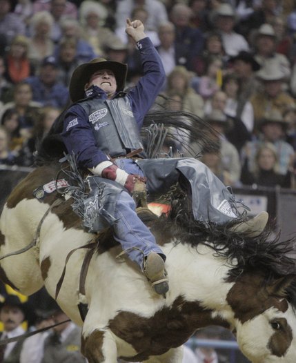 Steven Dent, of Mullen, Neb., competes during the first go-round of bareback riding at the National Finals Rodeo at the Thomas & Mack Center in Las Vegas, Thursday, Dec. 4, 2008.