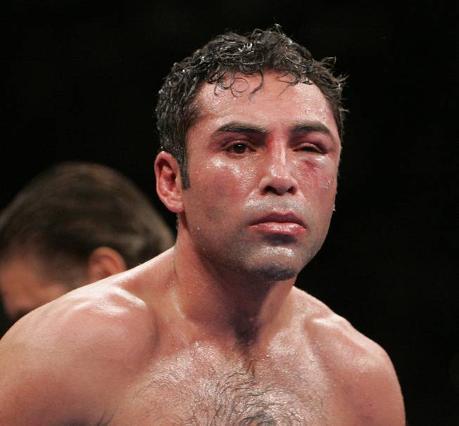 Oscar De La Hoya comes out of his corner for the eighth round during his welterweight fight against Manny Pacquiao at the MGM Grand Garden Arena. After losing the round and taking increasing punishment, De La Hoya's corner stopped the fight giving Pacquiao a TKO victory.