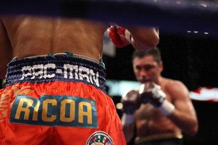 Filipino sponsors are displayed on the trunks of Manny 