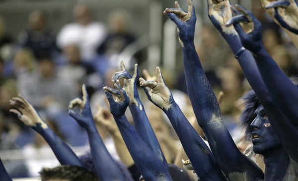 The UNR fans hold up the wolf sign Saturday at ...