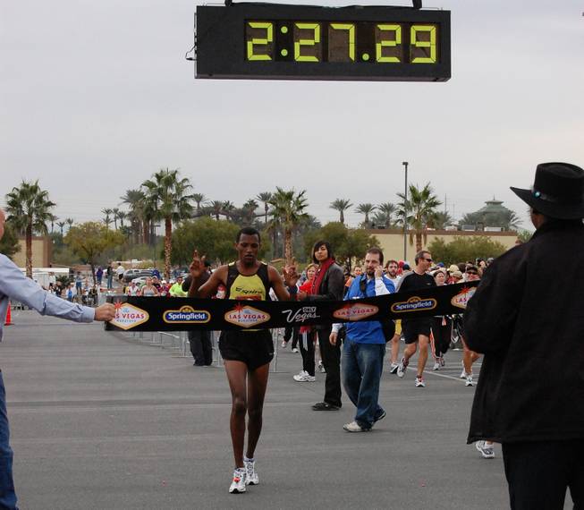 Las Vegas resident Abebe Yimer crosses the finish as the winner of the 2008 Las Vegas Marathon. The 28 year old Ethiopian was the first Clark County resident to ever win the race. 