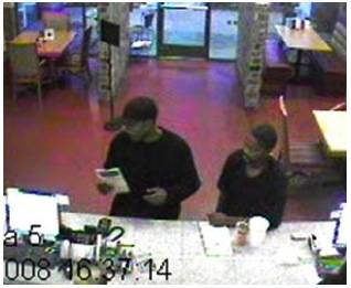 Two unidentified suspects robbing a restaurant a gunpoint located at the 5800 block of E. Charleston on Nov. 19.