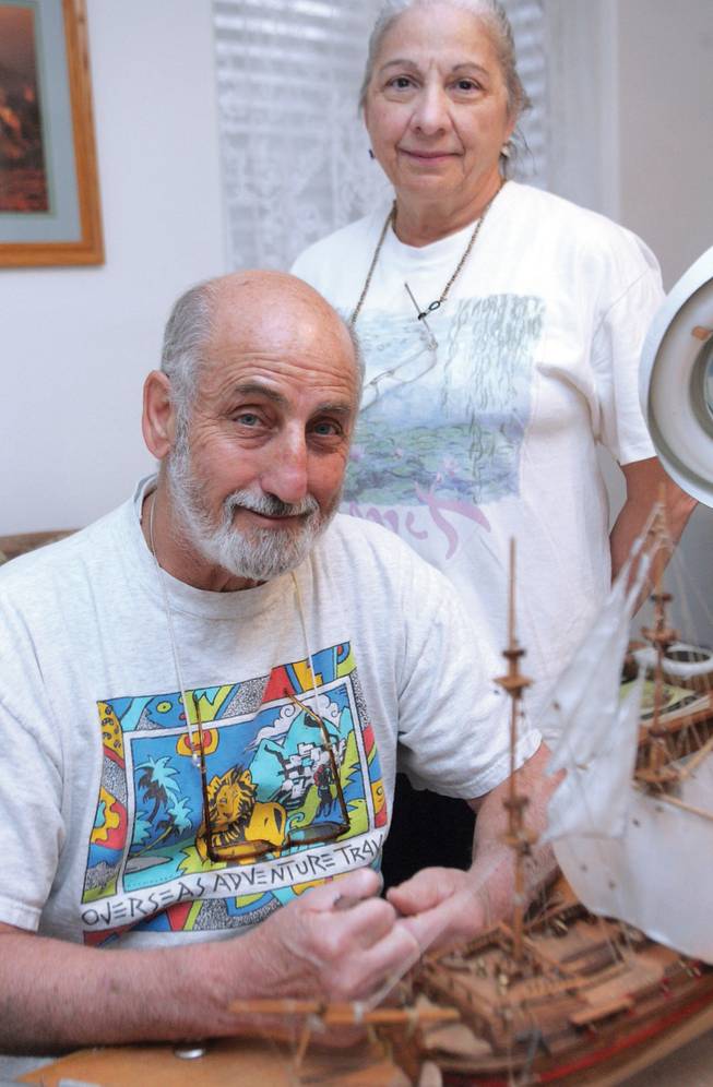 Frank and Joan Pomellitto, snowbirds from Half Moon, N.Y., pause for a photo in the basement of their Boulder City home.