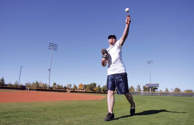 Recently added to the Yankees 40-man roster, Mike Dunn practices during his off-season training at the College of Southern Nevada's Lied Field on Dec. 3.
