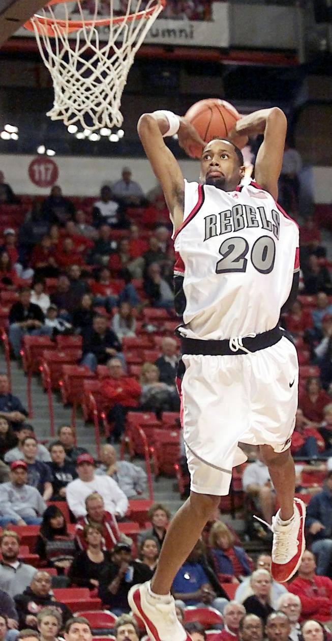 UNLV forward Chris Richardson swoops in to throw down a breakaway dunk in the second half against DePaul at the Thomas & Mack Center on Feb. 3, 2002. The Rebels defeated the Blue Demons 90-75. 