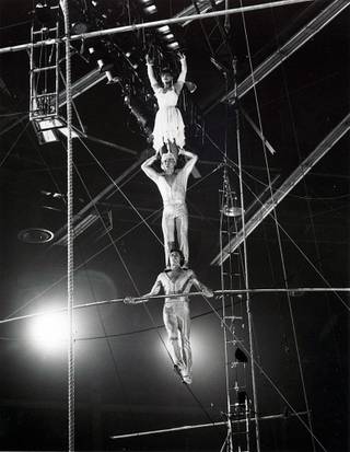 Fatima Gadjikovrbanova, top, balances atop her partner's shoulders during a daring act from her days with Ringling Bros. and Barnum & Bailey Circus. The photo was taken in the 90s before her husband's accident and before she moved to Las Vegas.