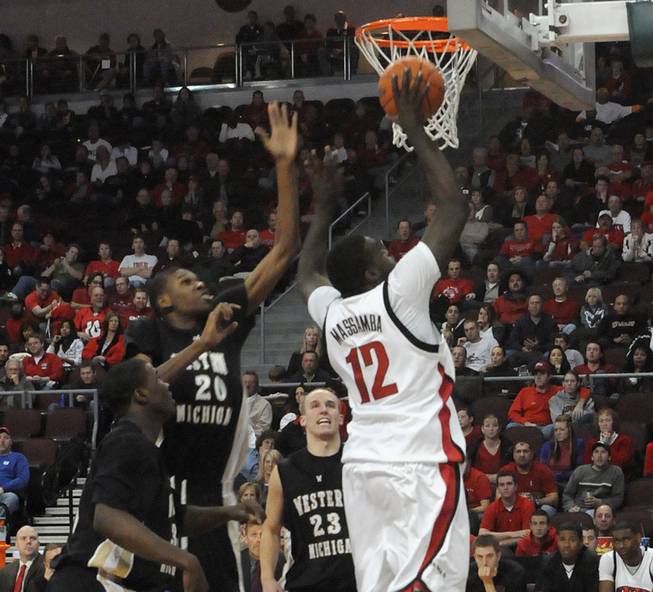 Brice Massamba of UNLV lays it in for two at the Orleans Arena where UNLV took on Western Michigan Sunday afternoon.  UNLV beat Western Michigan 70-61.