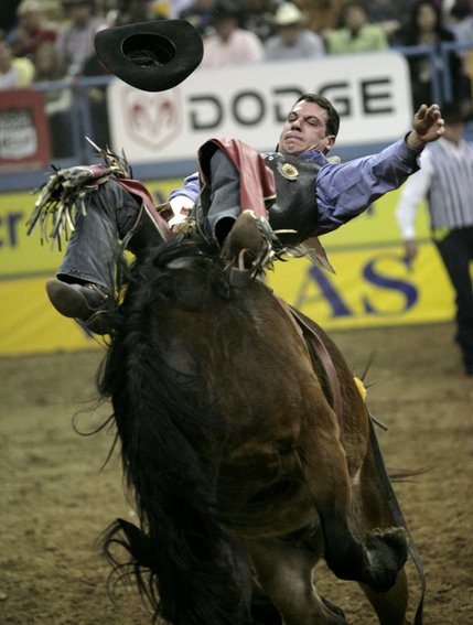 Scenes from Saturday night's action of the 50th anniversary of NFR at the Thomas & Mack Center.