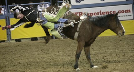 Scenes from Saturday night's action of the 50th anniversary of NFR at the Thomas & Mack Center.