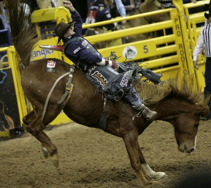 Scenes from Saturday night's action of the 50th anniversary of NFR at the Thomas & Mack Center.