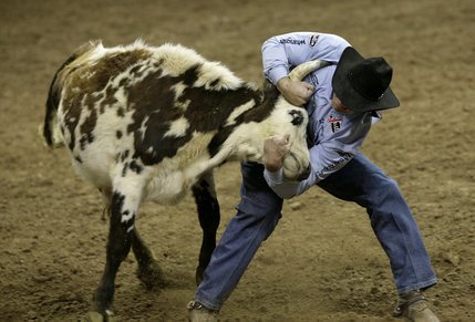 Scenes from Saturday night's action of the 50th anniversary of NFR at the Thomas & Mack Center.