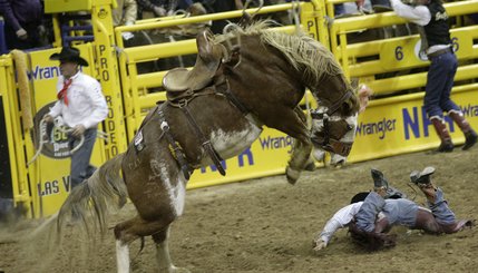 Scenes from Saturday night's action of the 50th anniversary of NFR at the Thomas & Mack Center.