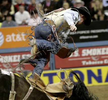 Scenes from Saturday night's action of the 50th anniversary of NFR at the Thomas & Mack Center.