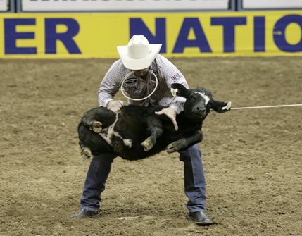 Scenes from Saturday night's action of the 50th anniversary of NFR at the Thomas & Mack Center.