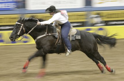 Scenes from Saturday night's action of the 50th anniversary of NFR at the Thomas & Mack Center.