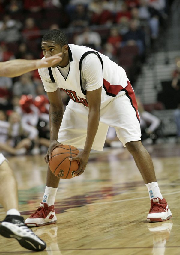 Oscar Bellfield of UNLV scans the court at the Orleans ...