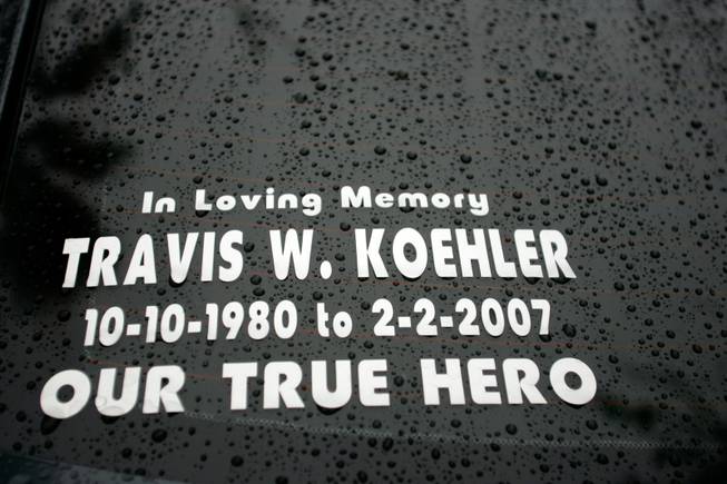 On the rear window of Debra Koehler-Fergen's car is a memorial to her son, Travis Koehler.