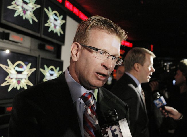 Arizona football coach Mike Stoops, talks to reporters after a Las Vegas Bowl news conference at ESPN Zone on Dec. 9.